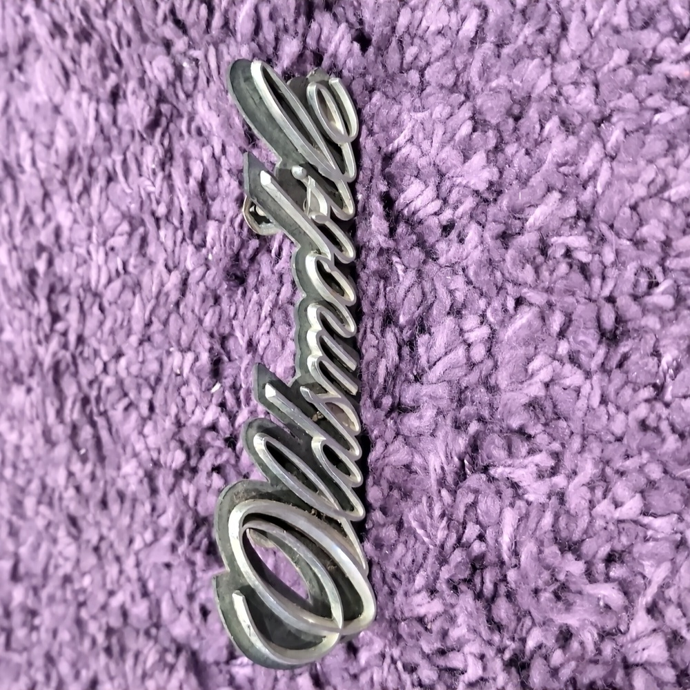 Vintage Oldsmobile Script Black Shadow backing Badge